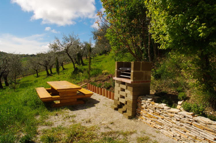 Barbecue area with bench